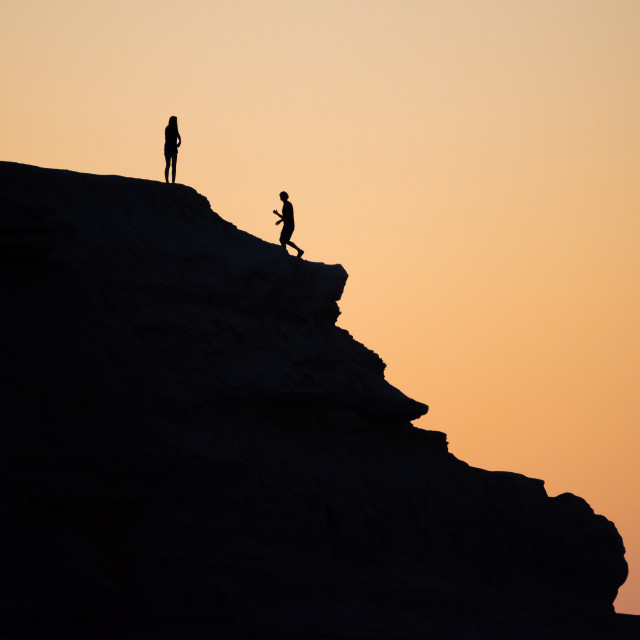 "Active Couple At Sunset" stock image