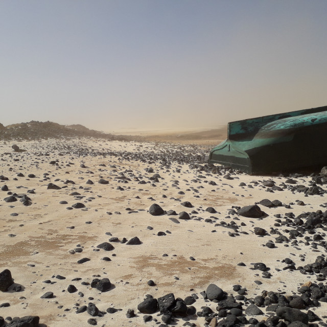 "Upturned boat on a windswept beach on Fuertventura" stock image