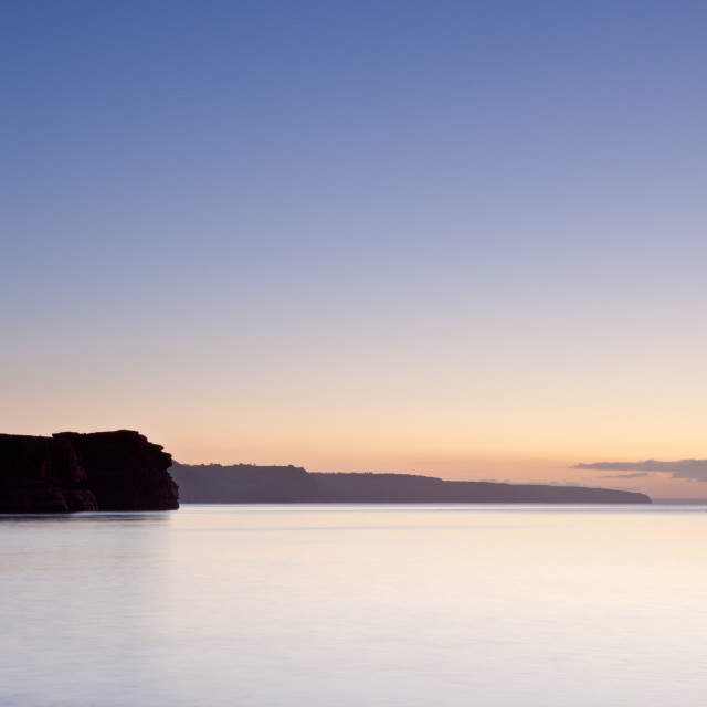 "Serene Dawn at Ladram Bay" by Bruce Little - £20.00 "Serene Dawn at Ladram Bay" stock image