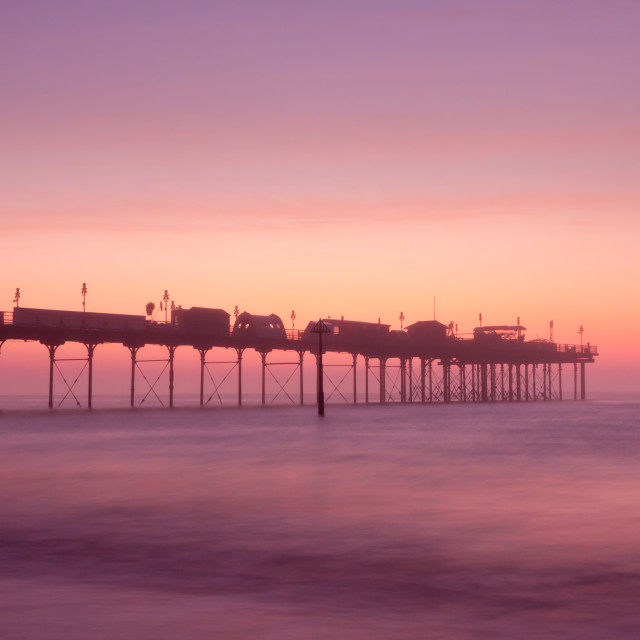 "Teignmouth Pier at Dawn" by Bruce Little - £20.00 "Teignmouth Pier at Dawn" stock image