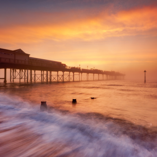 "Teignmouth Pier at Sunrise" by Bruce Little - £20.00 "Teignmouth Pier at Sunrise" stock image