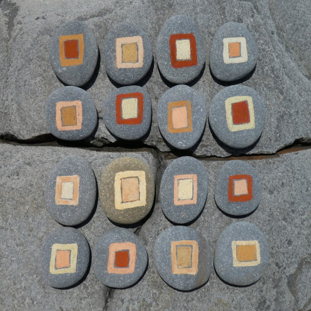 "beach pebbles on a rock painted with stone colors" by Lucia Pec - $12.36 "beach pebbles on a rock painted with stone colors" stock image