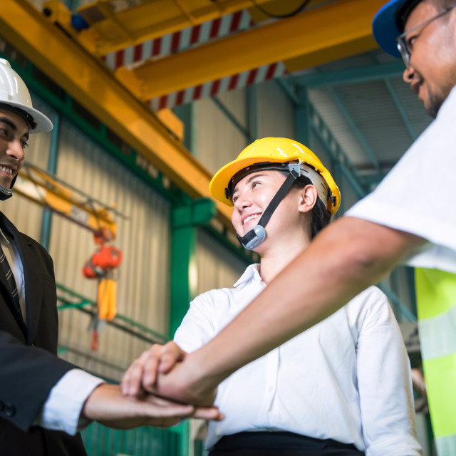 "Factory industrial teamwork. stack hands" stock image