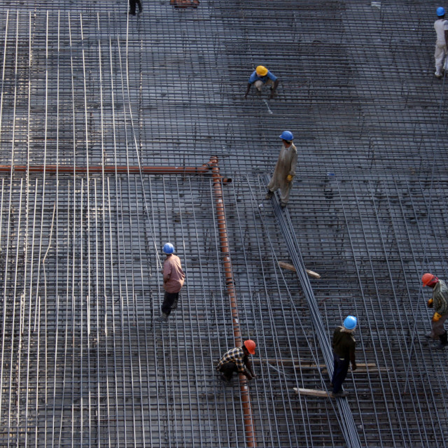 "Workmen on a construction site in Dubai, UAE" stock image