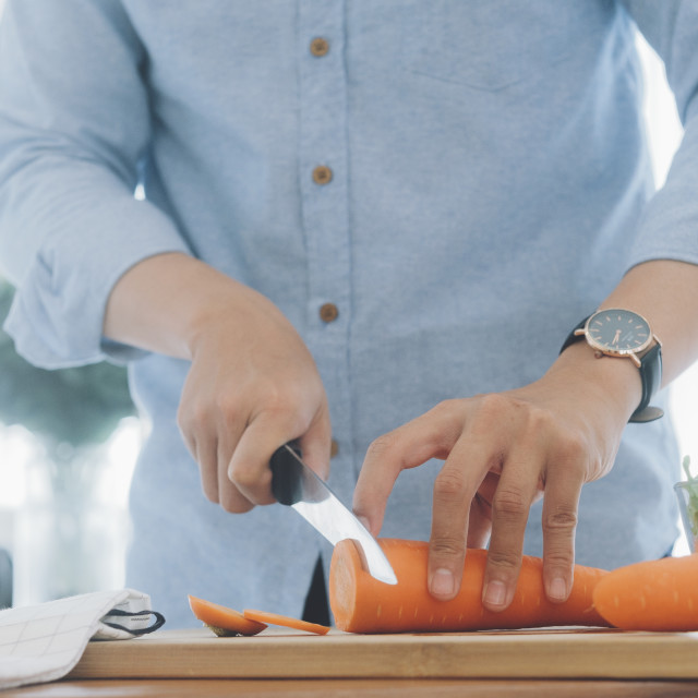 "Man preparing delicious and healthy food" stock image