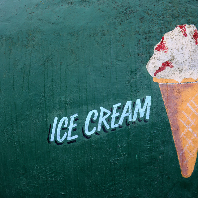 "Old painted ice cream sign" stock image