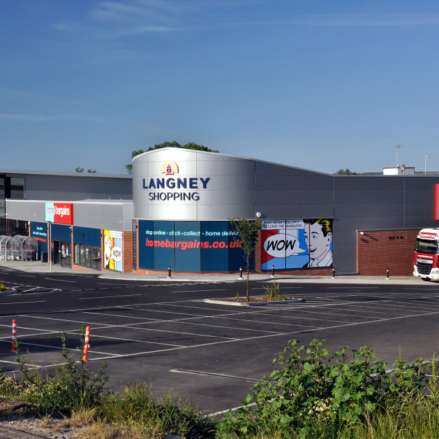 shopping centre on a sunny morning with home bargains delivery truck. Langney Shopping Centre