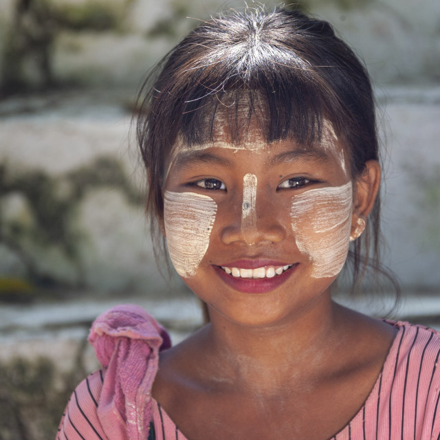"0176 - Myanmar, Amarapura, Aung Myay Thar Zan Pagoda: girl with thanaka bark make-up even on the forehead." stock image