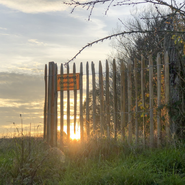 "garden gate in a meadow" stock image