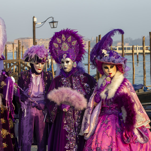 "Pink and Purple Costumes at Venice Carnival" by Bobb Strongman - £20.00 "Pink and Purple Costumes at Venice Carnival" stock image