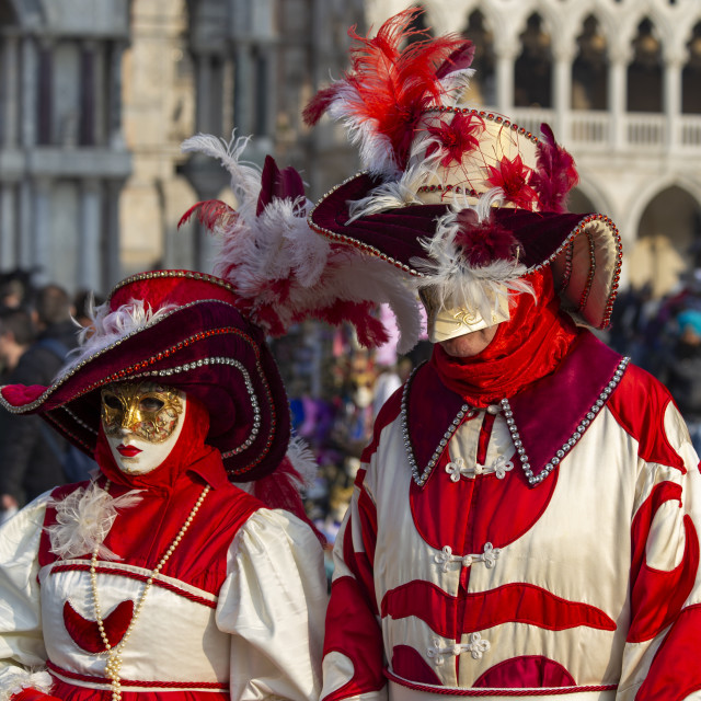 "Red and White Costumes at Venice Carnival" by Bobb Strongman - £20.00 "Red and White Costumes at Venice Carnival" stock image