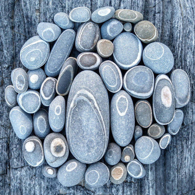 "Beach pebbles with natural circles" by Lucia Pec - $12.67 "Beach pebbles with natural circles" stock image