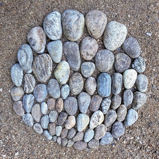 "Circle of river stones pebbles" stock image