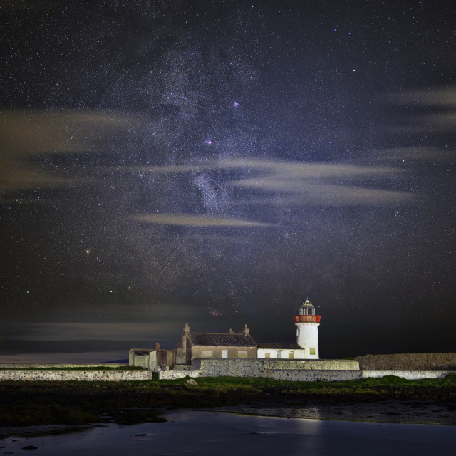 "Milky way over Mutton Island Lighthouse" stock image