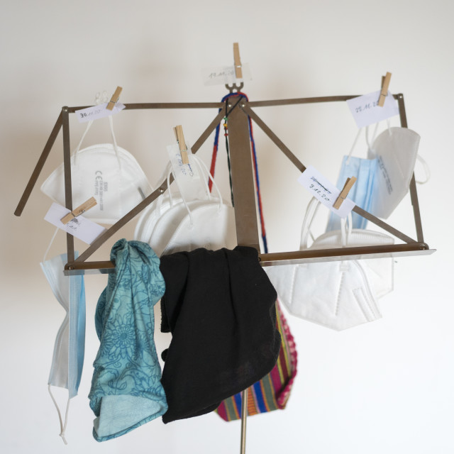 "Covid 19 masks drying on a music stand" stock image