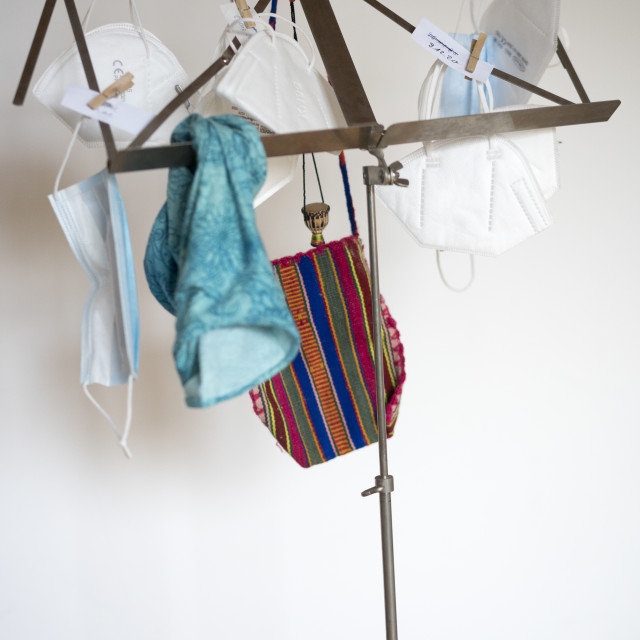 "Covid 19 masks drying on a music stand" stock image