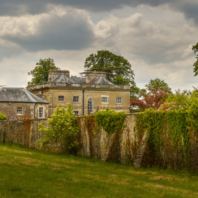 "A Country House And Stone Wall In Wiltshire" stock image