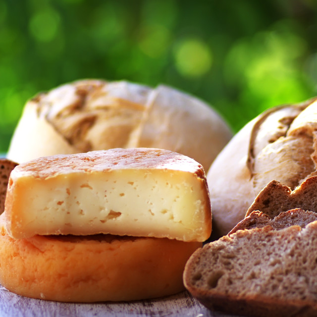 "traditional portuguese cheese and bread on table" stock image