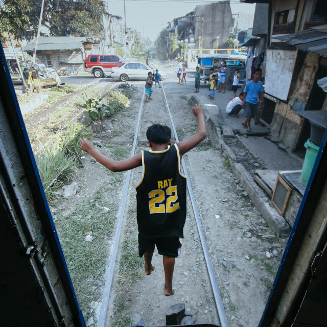 "Manila Killertrain-Dangerous Life in the Slums" stock image