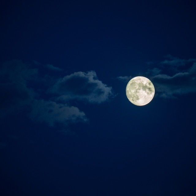 "full moon in the night sky with clouds" by Justin Mueller - £10.00 "full moon in the night sky with clouds" stock image