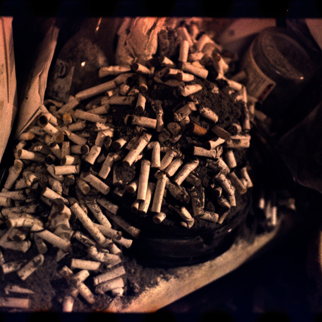 "Cigarette ashtray overflowing" by Zachary I Peabody - £10.00 "Cigarette ashtray overflowing" stock image