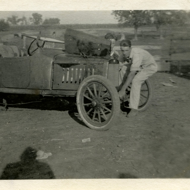 "Jesse Reed working on an old car" by Zachary I Peabody - £10.00 "Jesse Reed working on an old car" stock image