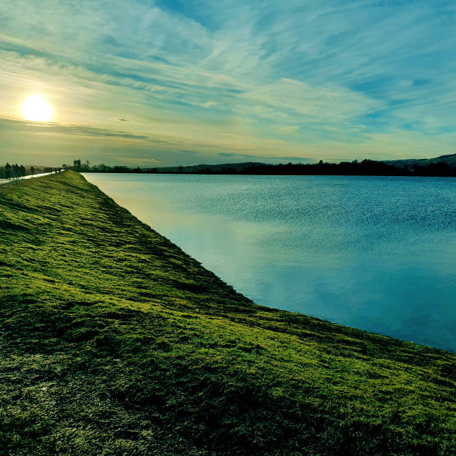 "Sunset on Reservoir near Glasgow Scotland" stock image