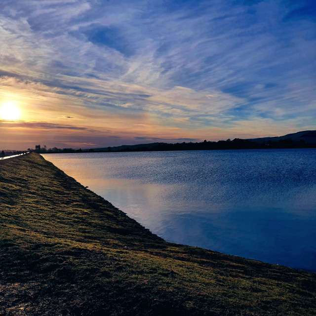 "Sunset over water Reservoir in Glasgow" stock image