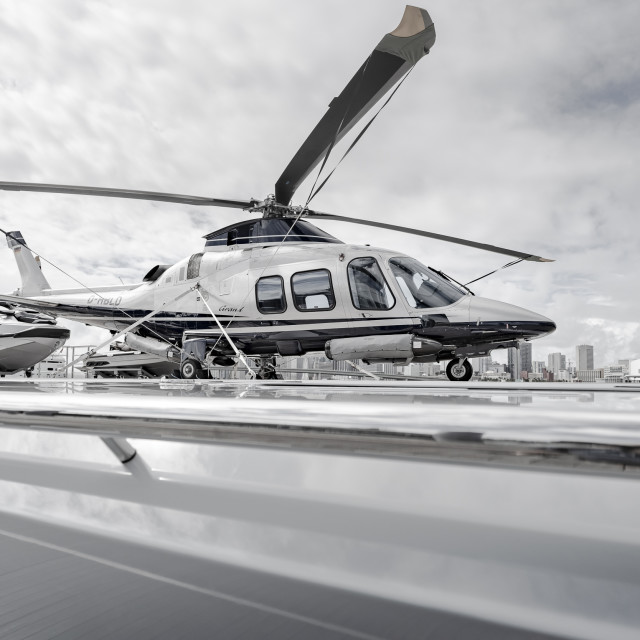 yacht in miami with helicopter