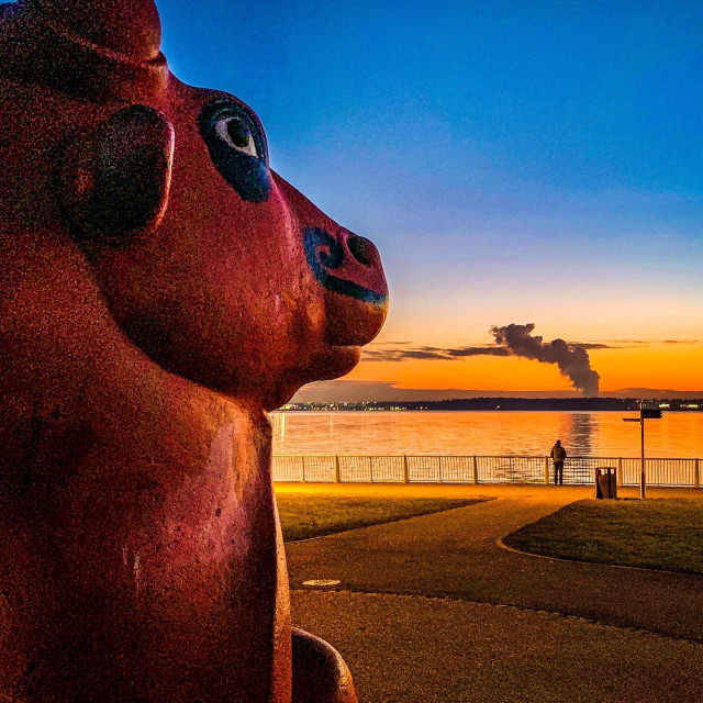 "Sitting Bull Statue at Otterspool Promenade at Sunset" stock image