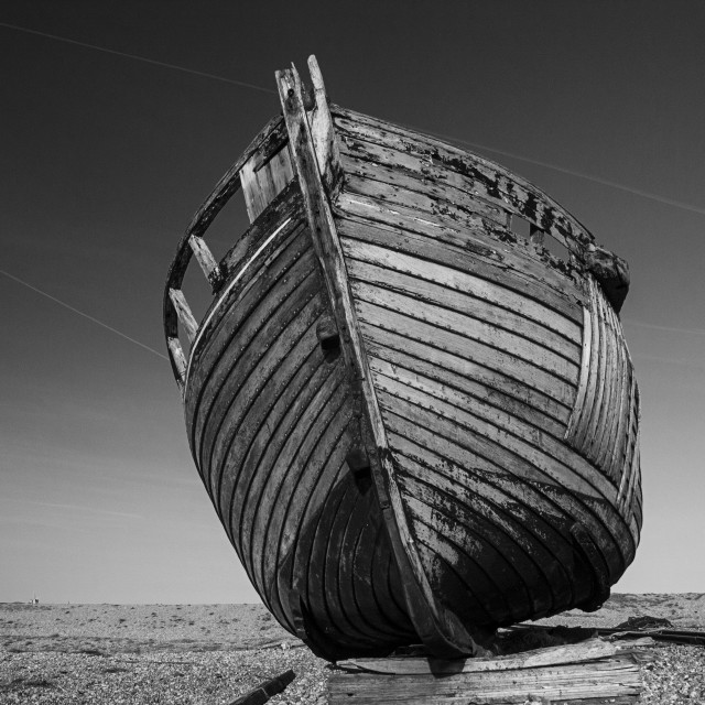 "BEACHED BOAT HULK. Dungeness, England" stock image