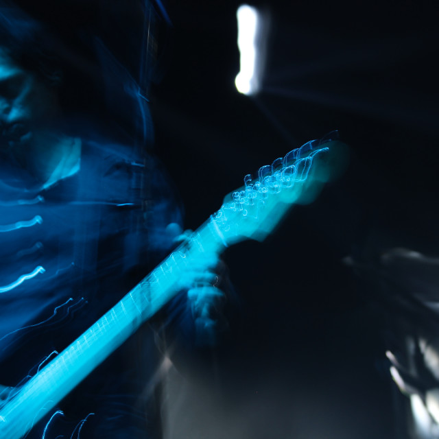 "Blurred Guitar Player" by Zachary I Peabody - £10.00 "Blurred Guitar Player" stock image