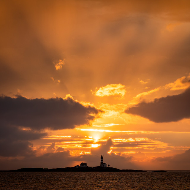 "Lighthouse in sunset" stock image