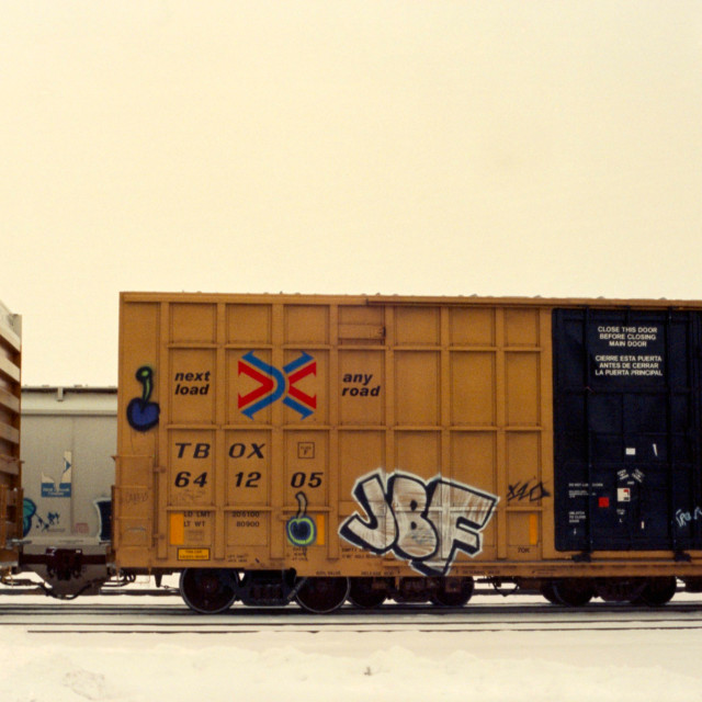 "Graffitied Train Car in the Winter" by Zachary I Peabody - £10.00 "Graffitied Train Car in the Winter" stock image