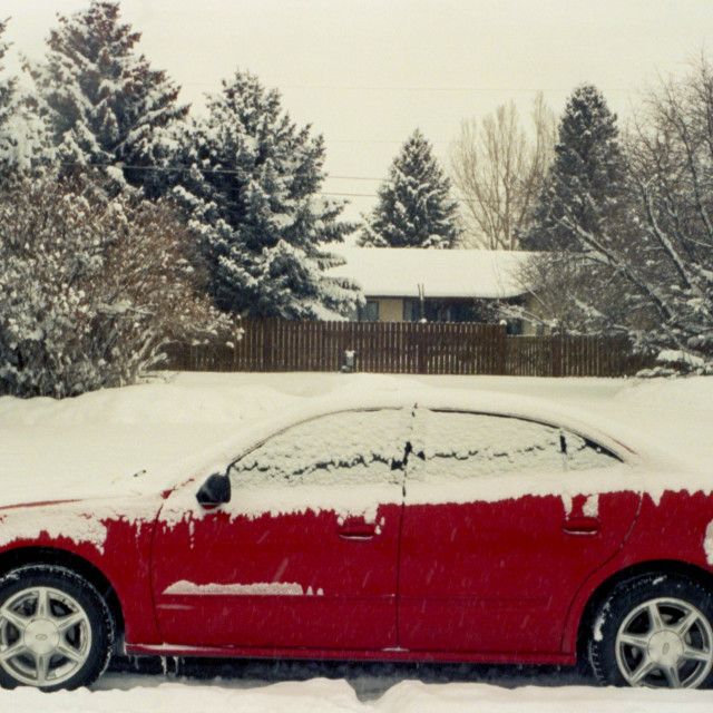 "Red Car in Winter" by Zachary I Peabody - £10.00 "Red Car in Winter" stock image
