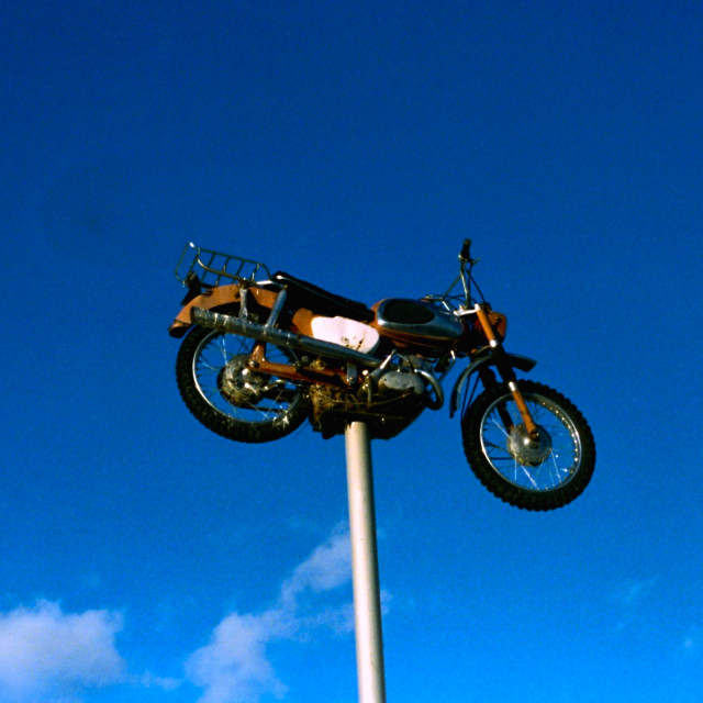 "Motorcycle on a stick" by Zachary I Peabody - £10.00 "Motorcycle on a stick" stock image