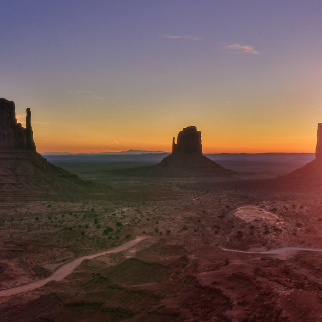 "Monument Valley Sunrise - Panoramic" by Russell Waite Photography - $26.93 "Monument Valley Sunrise - Panoramic" stock image