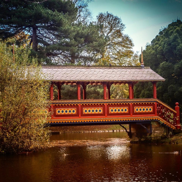 "The Swiss Bridge over the lake in Birkenhead Park in The Wirral" stock image