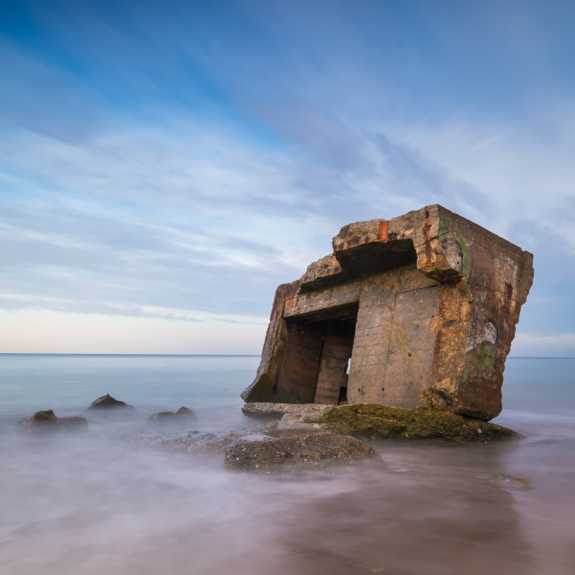 "Soft light over Cayton Bay pillbox" stock image