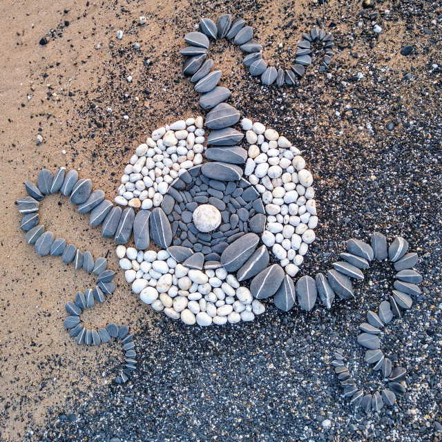 "Landart sun moon earth stars from stones" stock image