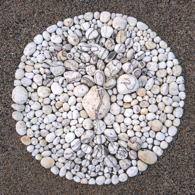 "Landart tree of life made from white beach pebbles" stock image