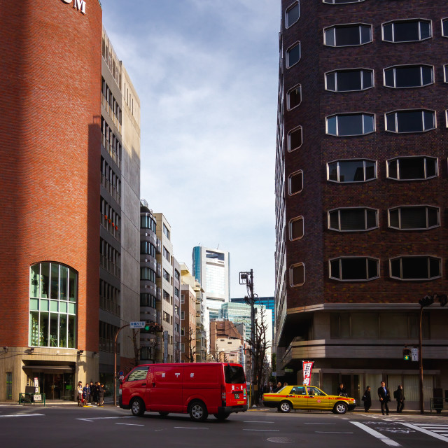 "Japanese Postal Van and Taxi Crossing an Intersection in Tokyo" by Justin Mueller - £10.00 "Japanese Postal Van and Taxi Crossing an Intersection in Tokyo" stock image
