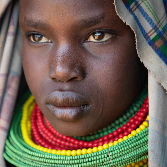 "Young Nyangatom Woman" by Anibal Bueno - $12.20 "Young Nyangatom Woman" stock image