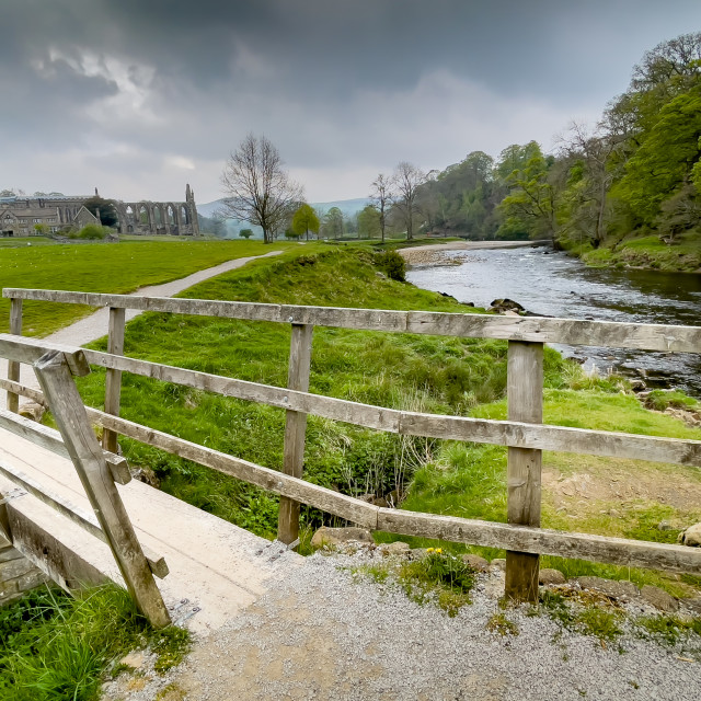 "River Wharfe with Footbridge to Bolton Abbey Ruins, Yorkshire," stock image