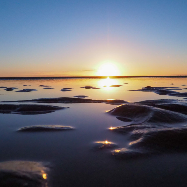 "FC005 Sunrise on Sandyford beach" stock image
