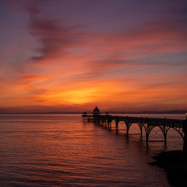 "Sunset over Clevedon Pier" by Pete Griffiths - £10.00 "Sunset over Clevedon Pier" stock image