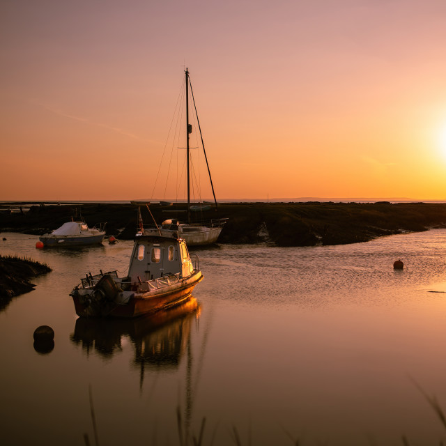 "Sunset on the boats" by Pete Griffiths - £10.00 "Sunset on the boats" stock image