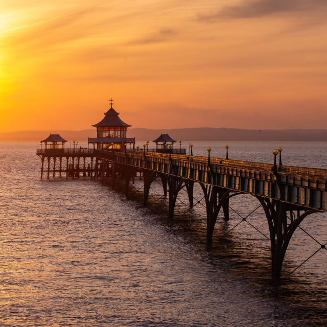 "Sunset over Clevedon Pier" by Pete Griffiths - £10.00 "Sunset over Clevedon Pier" stock image