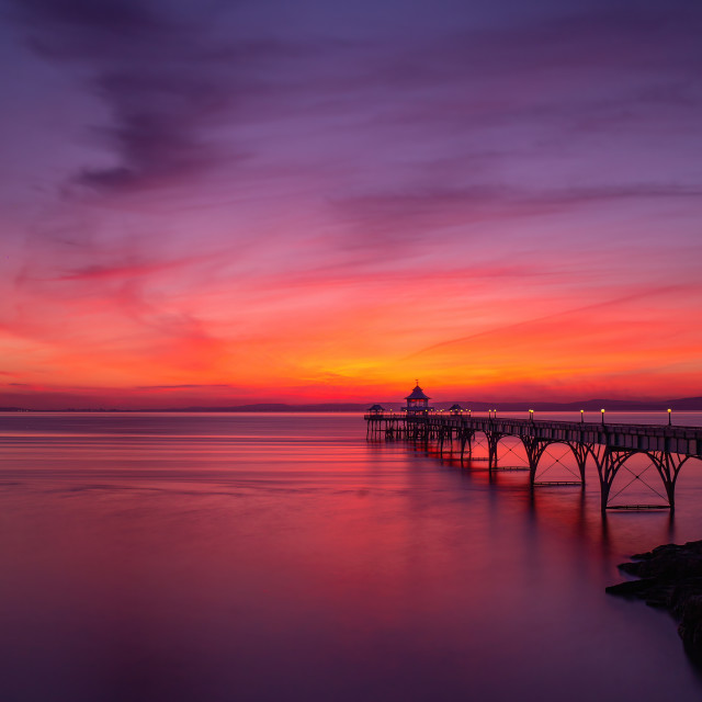 "Sunset over Clevedon Pier" by Pete Griffiths - £10.00 "Sunset over Clevedon Pier" stock image