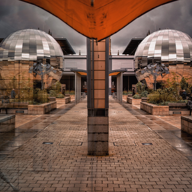 "Millennium Square Reflections" by Pete Griffiths - £10.00 "Millennium Square Reflections" stock image